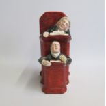 A Staffordshire group of Vicar and Clerk in a Pulpit. Date: 1825 Size: 11x10.5cm diameter, 21.5cm