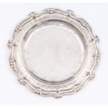 A Victorian silver shaped circular card tray, cast wavy rim with engraved central section, by George