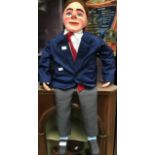 A mid to late 20th Century ventriloquist's puppet of Archie Andrews, papier mache head, wearing a