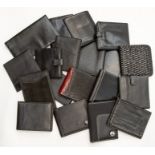 Nineteen various recent and vintage gentleman's leather wallets in black. (19) Condition: some