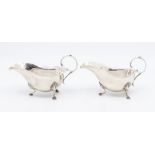 A pair of Georgian style sauce boats, on shell and hoof feet, by Deakin & Francis,Birmingham, 1921-