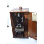 A W Watson & Sons microscope, London, Service II, serial number 1062525, adjustable mechanism, black