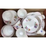 A Shelley part tea set, pattern number L2372 wild flowers design, comprising six cups and saucers,