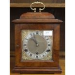 A 20th Century walnut veneered eight day mantle clock, Westminster chime, spring driven movement,