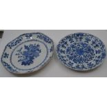 Two Chinese blue and white dishes, 18th Century, the first of octagonal shape and decorated with