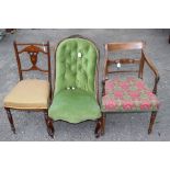 An early Victorian rosewood spoon back chair, an early 19th Century mahogany carver chair and an