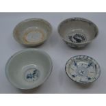 Four Chinese Ming Dynasty blue and white bowls, 16th to 17th Century, each with hand painted