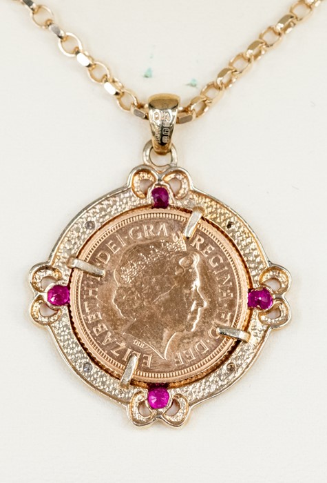 A Royal mint half Sovereign pendant, the 'Aphrodite' half Sovereign dated 2008 within a 9ct gold