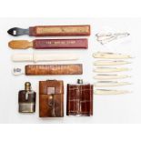 An assembled group of vintage gentleman's accessories, including two crocodile lined hip flasks, a