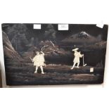 A Japanese bone lacquered panel with figures in relief Mt Fuji in the background on black ground and