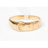 A 9ct gold ladies dress ring, in the form of a buckle, width approx. 5mm, ring size T, weight