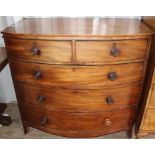 An early 19th Century mahogany chest of drawers, fitted with two short over three drawers, with