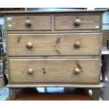 A Victorian pine chest of drawers, comprising two short over two long graduated drawers, raised on