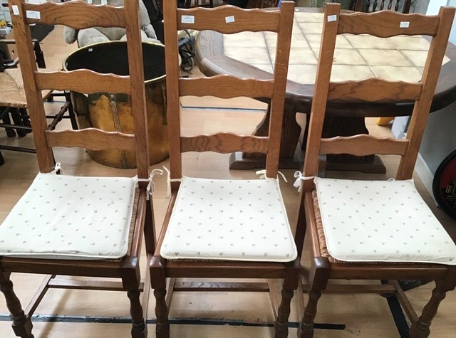 A late 20th Century oak dining table, with tiled top, together with a set of six oak ladder back - Image 2 of 4