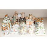 A collection of Staffordshire burners, flat back house, all 19th Century, including moneybox, in the