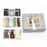 A collection of various late 20th Century gas cigarette lighters, including Waterman, Colibri,