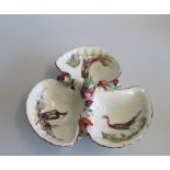 A Continental 20th century Sweet-Meat Shell shaped Stand. Decorated with Sea shells, coral and