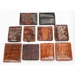 Ten various recent and vintage gentleman's crocodile wallets. (10) Condition: signs of use to all.