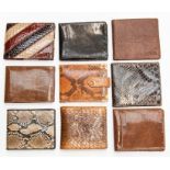 Nine various recent and vintage gentleman's snakeskin wallets. (9) Condition: some appear unused,