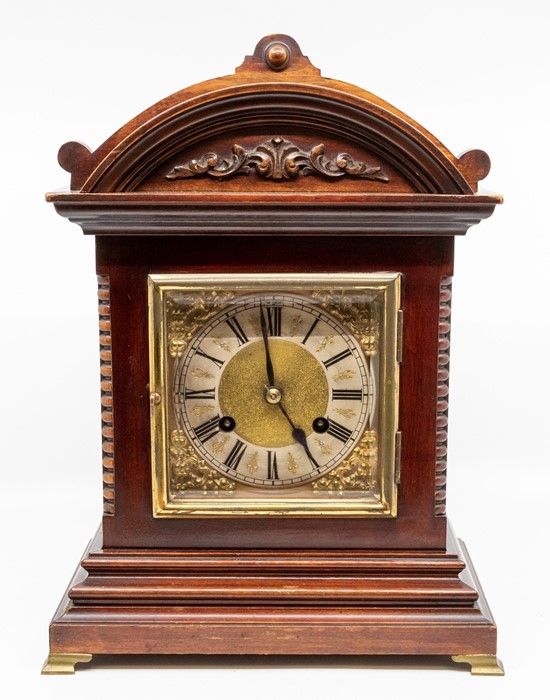 A German mahogany bracket clock, early 20th Century, with architectural case, the brass dial with