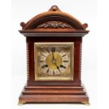 A German mahogany bracket clock, early 20th Century, with architectural case, the brass dial with