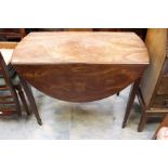 An Edwardian mahogany Pembroke table, fitted with a single drawer, raised on square tapered legs,