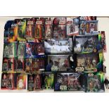 A collection of assorted Star Wars figures, mostly carded/boxed, including: The Power of The
