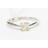 An old cut diamond ring, comprising an old cushion cut diamond of approx 0.50ct, assessed colour