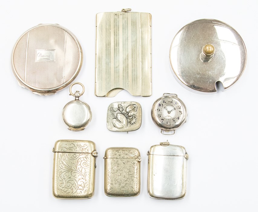 A collection of early 20th Century silver and silver plate including a silver compact powder puff