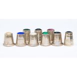 Thimbles; a collection of assorted silver and gemstone set thimbles, inset with Blue John,