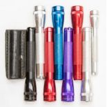 A group of Mini Maglite AA and AAA battery torches, aluminium bodies with adjustable beams, in