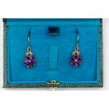A pair of amethyst and silver gilt drop earrings, comprising a cluster of pearl cut amethysts of