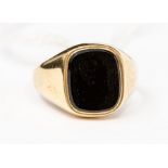 A 9ct gold and onyx signet ring, cushion shaped onyx approx. 11 x 9mm, size R½, total gross weight