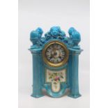 A Sevres style porcelain mantel clock, circa 1890, of canted square architectural form with corner