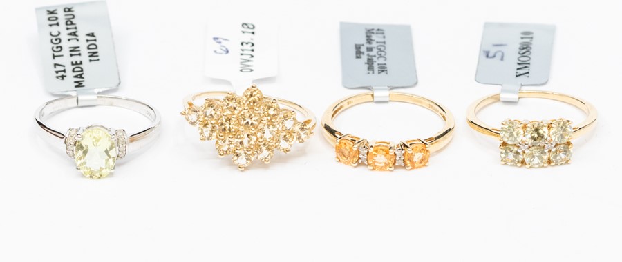 A Ceylon zircon and diamond 9ct gold dress ring, comprising six round cut zircon with diamond - Image 2 of 2