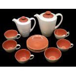 A mid century Poole pottery coffee set, pink and cream colour, AF