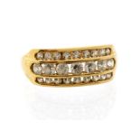 A cubic zirconia  and 9ct gold dress ring, channel set with three rows stones, width approx. 8mm,