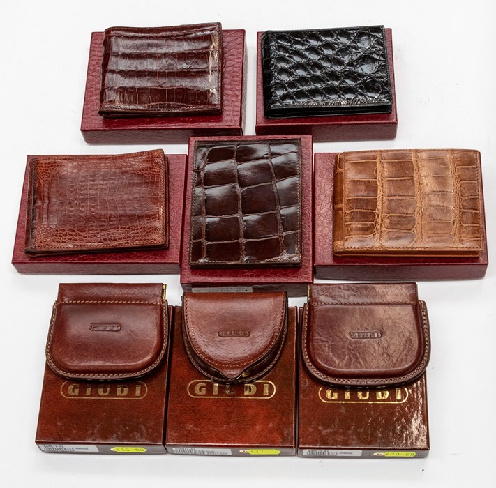 A group of Italian leather and crocodile wallets and change purses by Giudi, Longhini and other