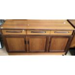 A GPlan teak sideboard, fitted with three drawers over three doors, 76 high x 142 wide x 45 depth