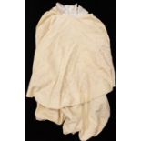 A collection of baby capes and pram covers to include a large cream Christening cape in wool, a