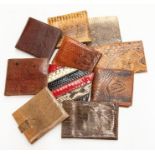 Ten various recent and vintage gentleman's snakeskin wallets. (10) Condition: some appear unused,