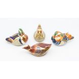 Four Royal Crown Derby paperweights including a farmyard hen, duck, grouse and dove