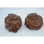 A pair of Chinese carved hardwood figures of sleeping Buddha