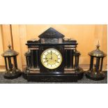 A late 19th Century J Unghans black and marble garniture clock set, comprising eight day mantle