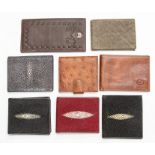 A group of six recent vintage exotic hide gentleman's wallets, including stingray and ostrich