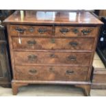 A Queen Anne walnut chest of drawers, comprising two short over three drawers, replaced handles