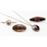 A collection of silver and blue John jewellery to include an oval pendant with rope edge border,
