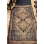 Two mid 20th Century woollen rugs, worn (2)