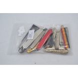 Twenty-four various vintage and recent small folding pocket knives, including white metal, embossed,