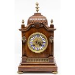 A French mahogany bracket type mantel clock, circa 1900, of gothic influence architectural form with